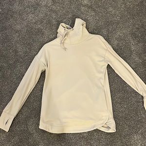 Flexible, light weight, soft long sleeve turtle neck style workout long sleeve.